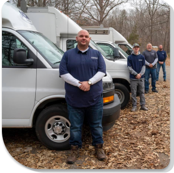 Technicians by trucks